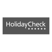 Logo von HolidayCheck - Firmenkunde von yuutel